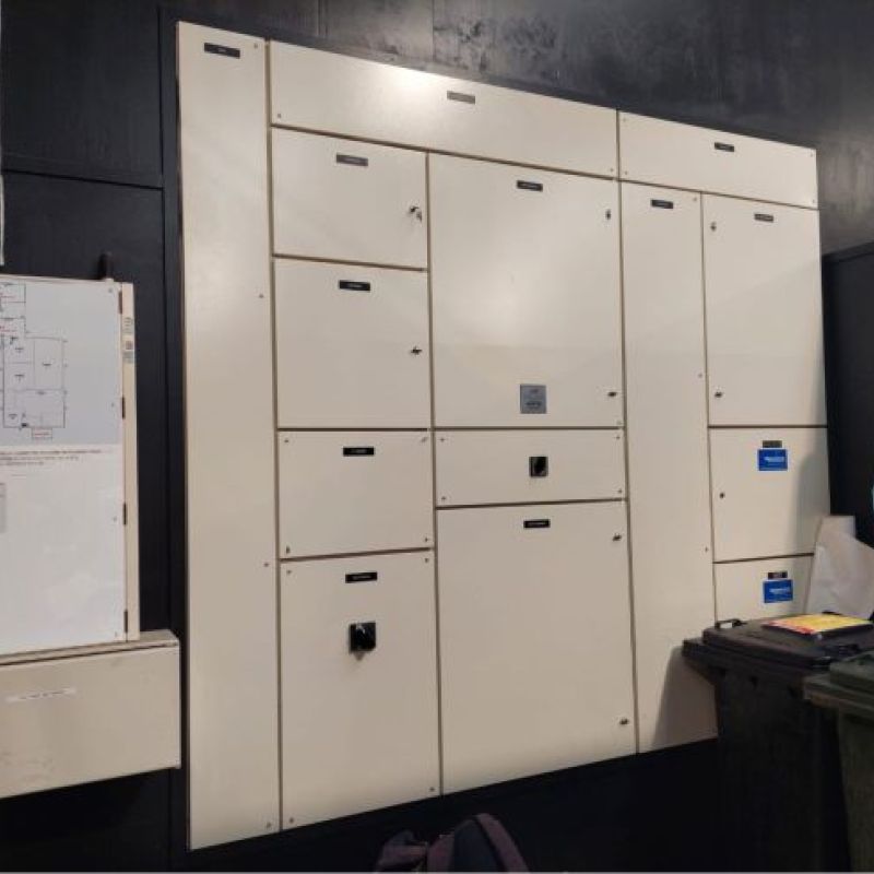 Industrial main switchboard with 400A main switch on black wall