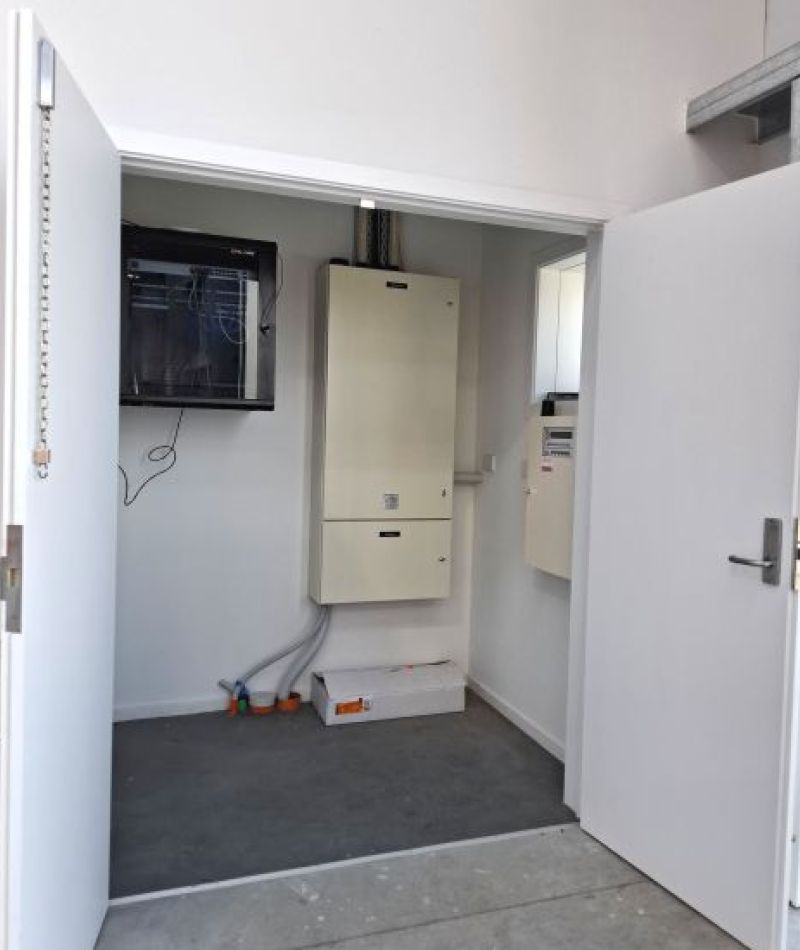 Tall switchboard with 24TP inside a data and controls cupboard